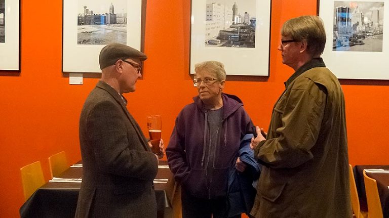 Raymond chats with photographers Kathy Brown and Lindsay Martin